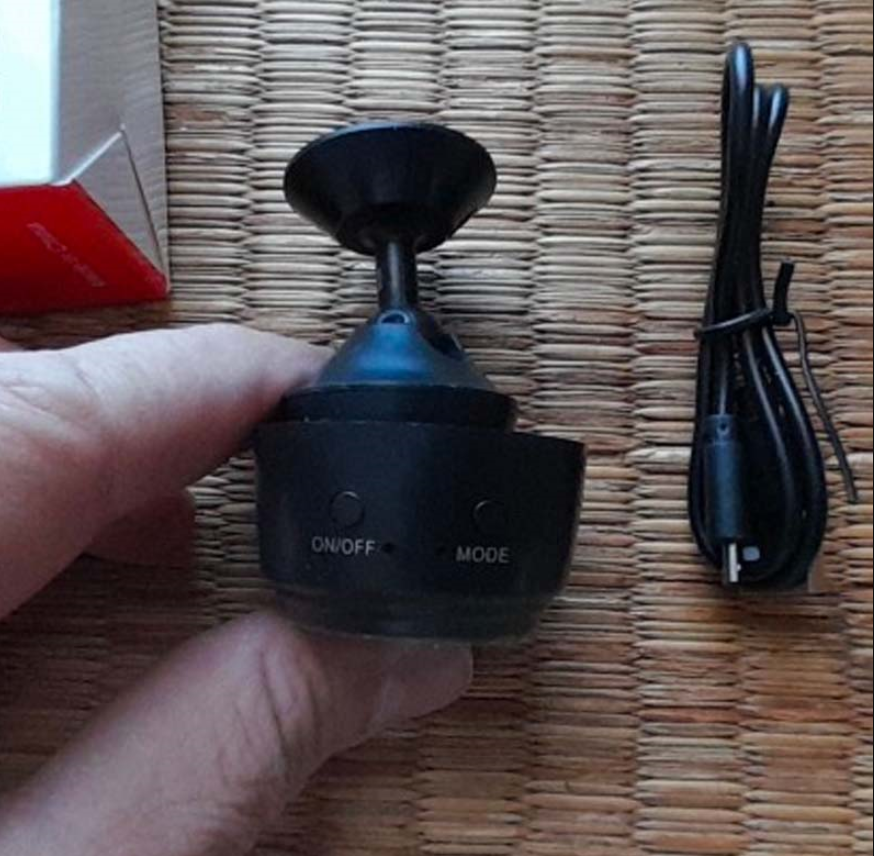 person holds MiniPix Camera